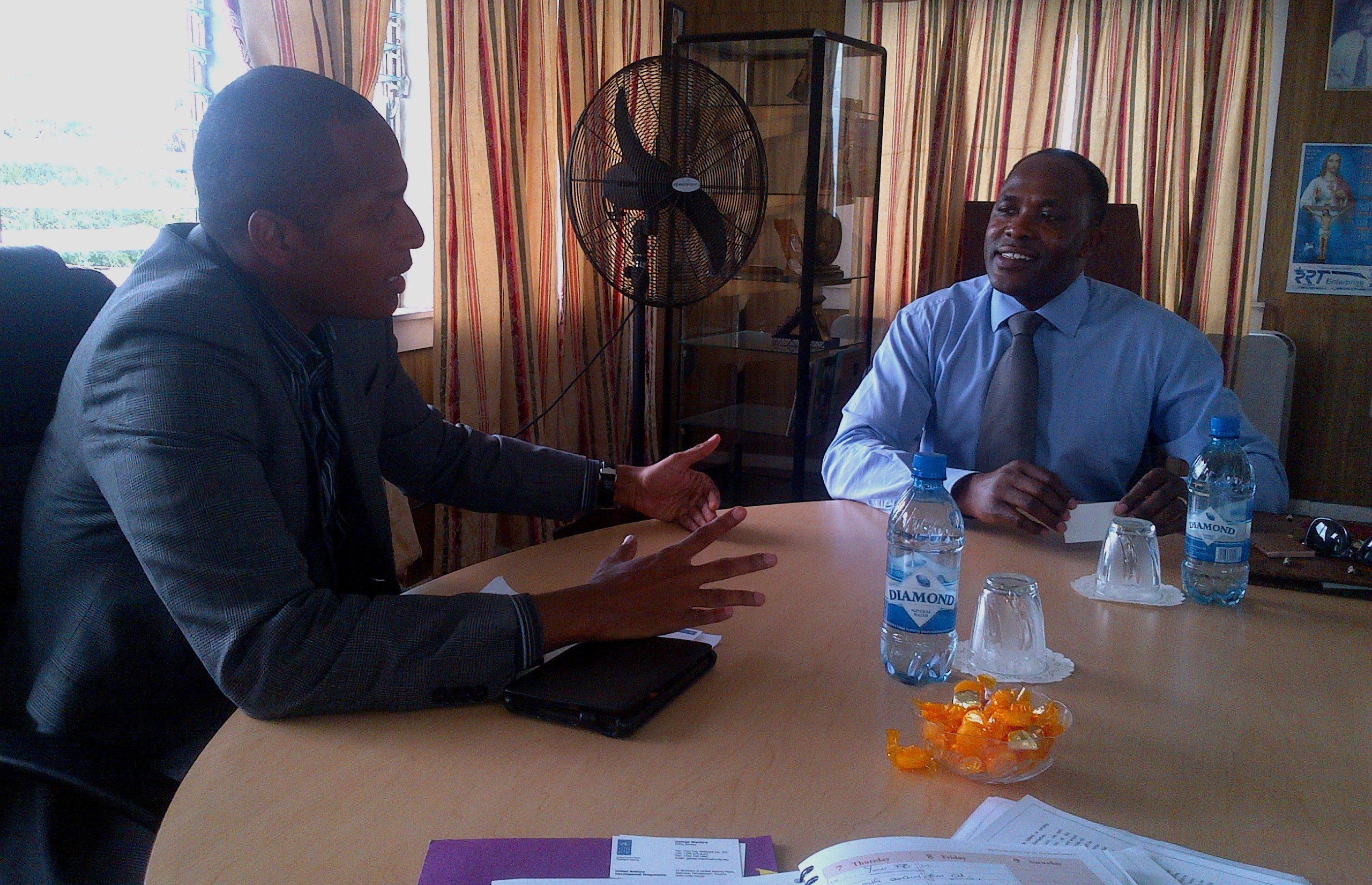 UNDP’s Policy Advisor, George Wachira meets with GCCI’s President, Clinton Urling at the Office of the Chamber on Friday, September 13, 2013.